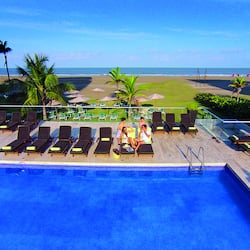 Outdoor pool, open 8 AM to 8 PM, pool loungers