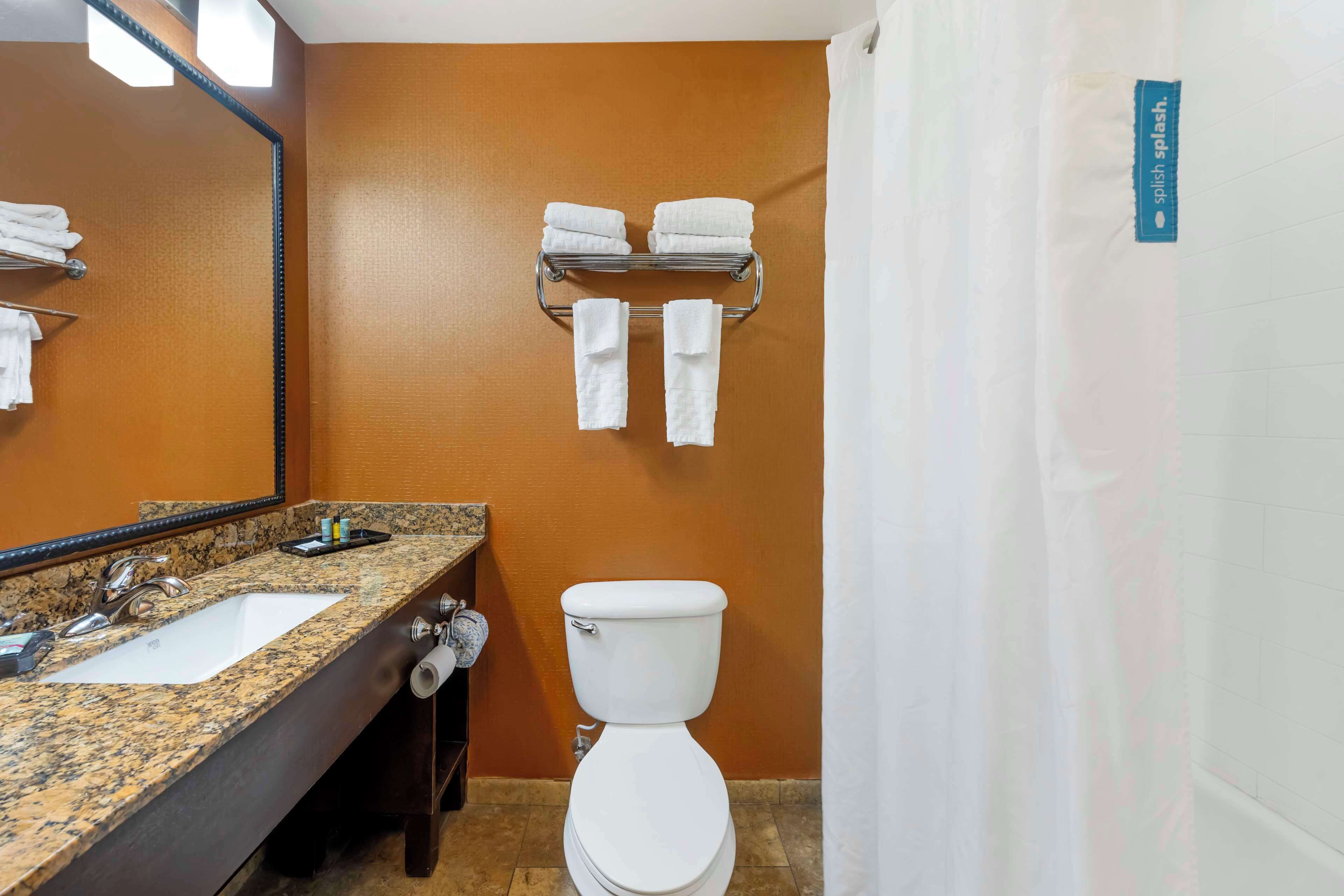 standard room, 2 queen beds, non smoking, refrigerator & microwave | bathroom | free toiletries, hair dryer, towels