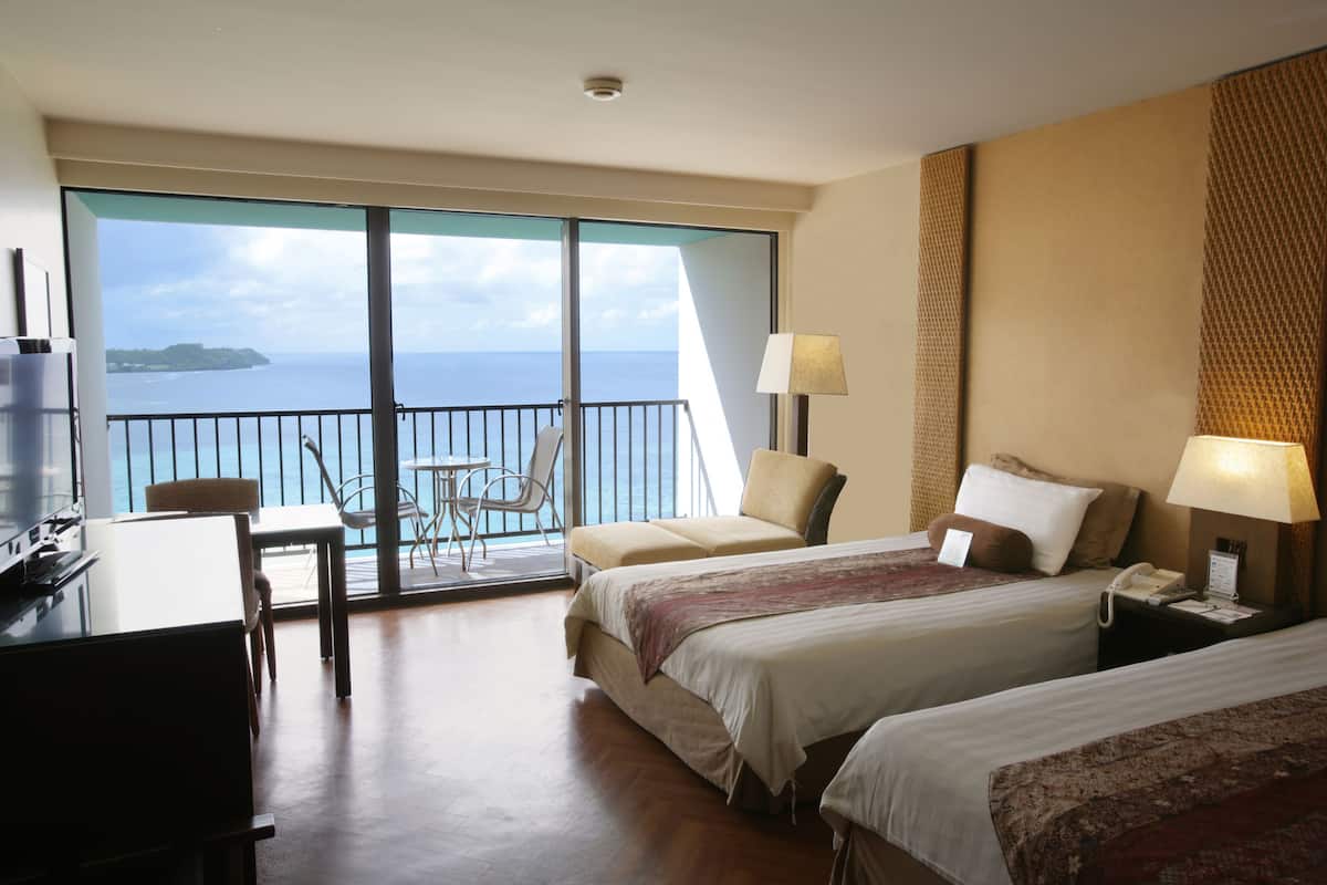 Camera con 2 letti singoli, fronte oceano (Infinity Tower) | 1 camera, minibar, una cassaforte in camera, una scrivania