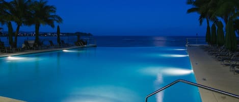 Outdoor pool, open 8:00 AM to 10:00 PM, pool umbrellas, pool loungers