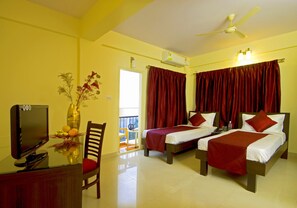 Superior Room (With A/C) | Premium bedding, desk, iron/ironing board, free WiFi - Mels Regency (Bengaluru)
