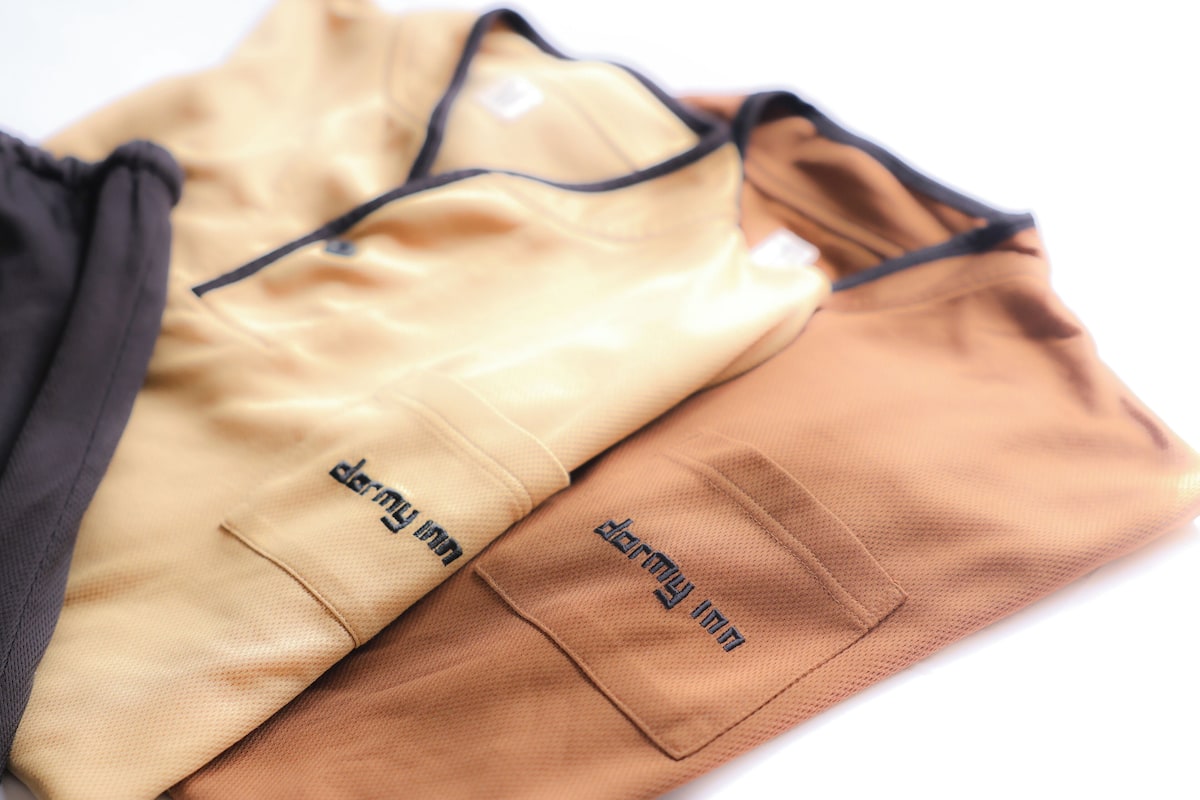 A pair of folded pants with visible text on the pockets.