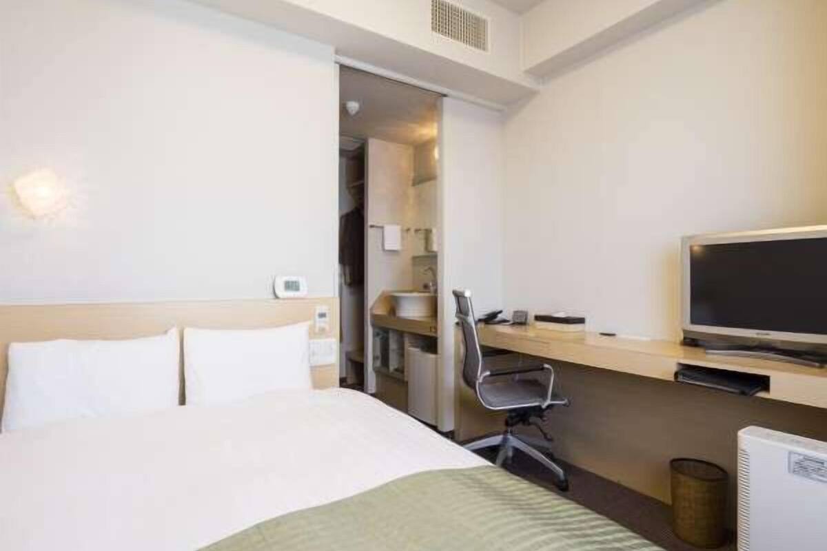 Down comforters, desk, blackout drapes, soundproofing