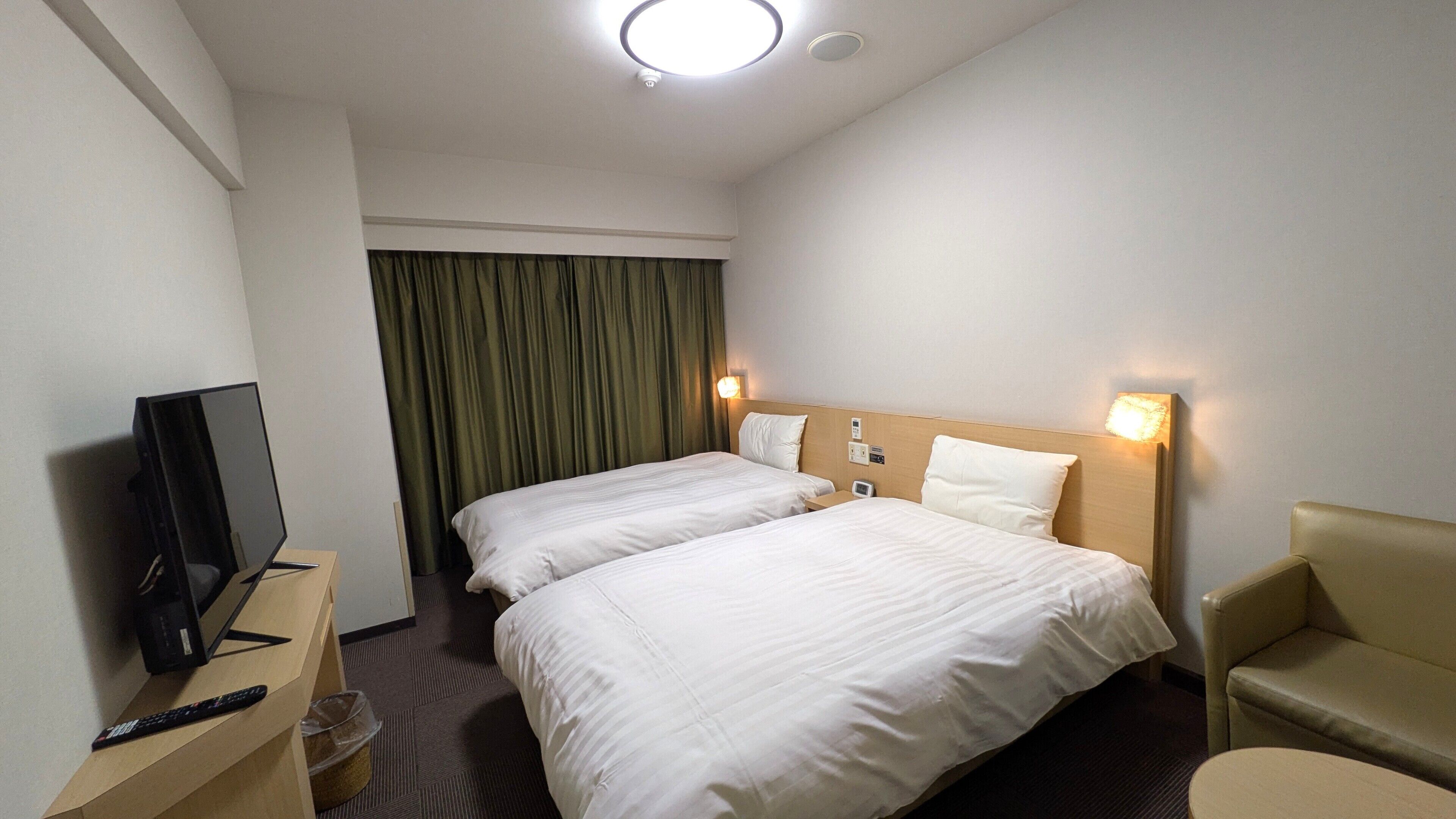 Desk, blackout drapes, soundproofing, free WiFi