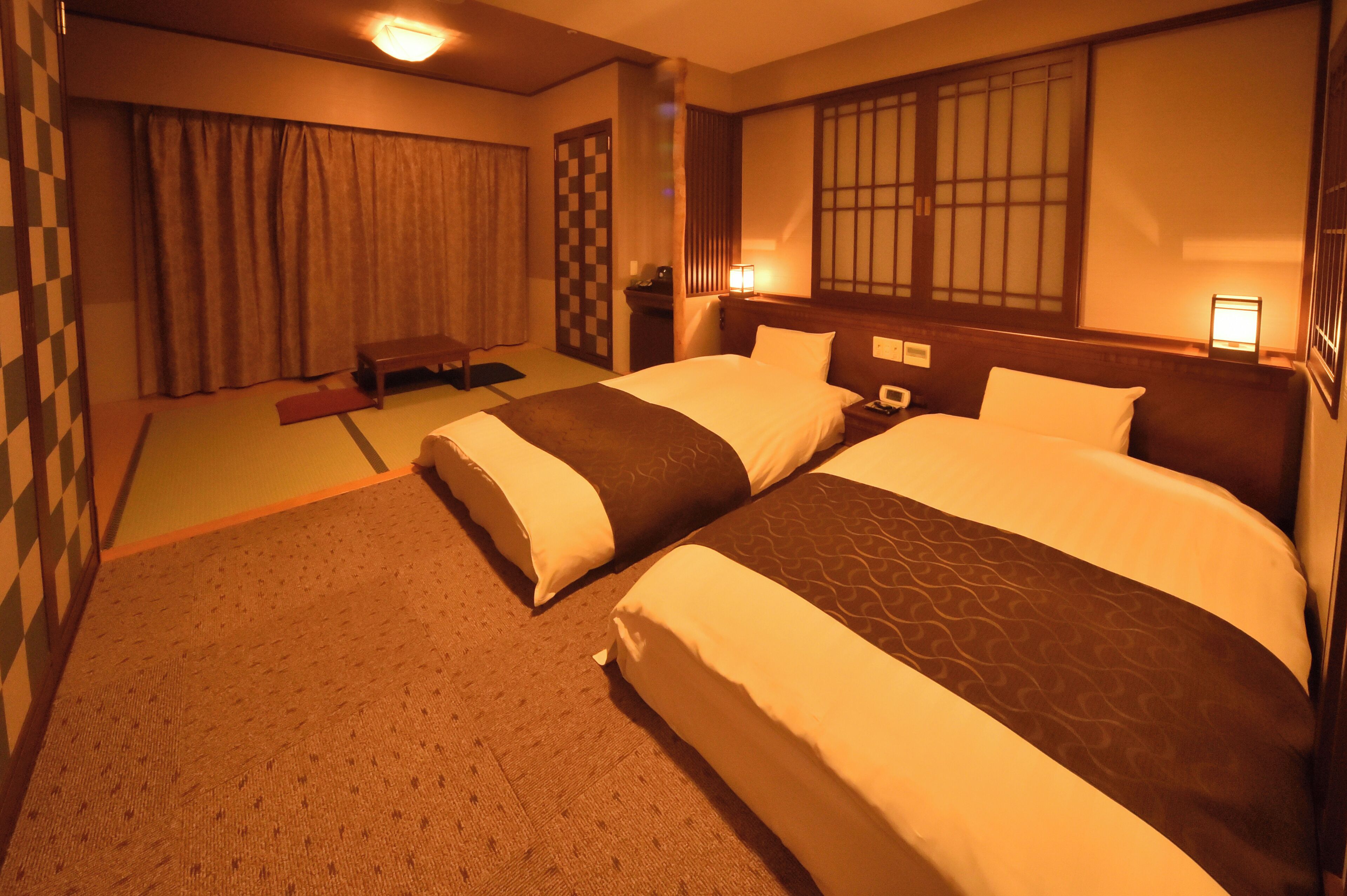 Down comforters, desk, blackout drapes, soundproofing