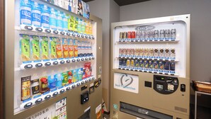 A vending machine with various beverages and snacks. - Dormy Inn Premium Otaru Natural Hot Spring (Otaru)