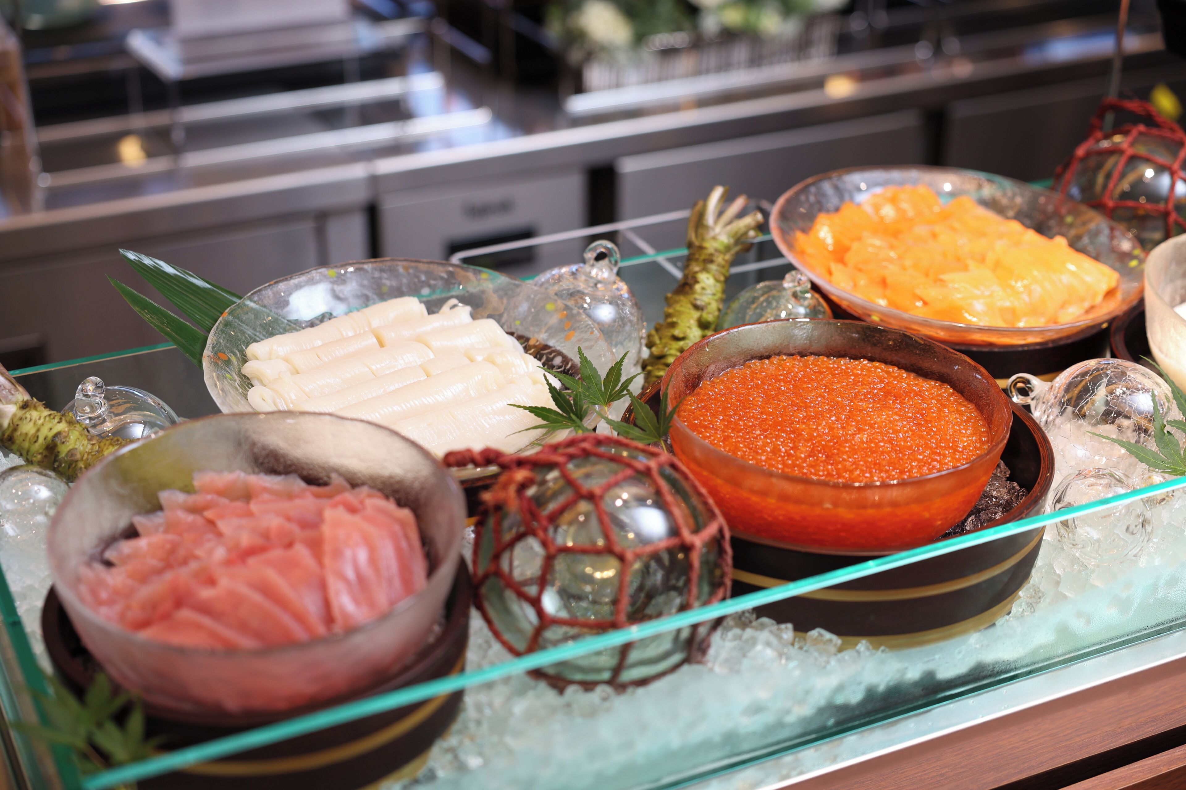 A variety of food items displayed on a glass tray.