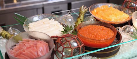 A variety of food items displayed on a glass tray.