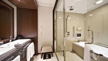 Combined shower/tub, eco-friendly toiletries, hair dryer, slippers