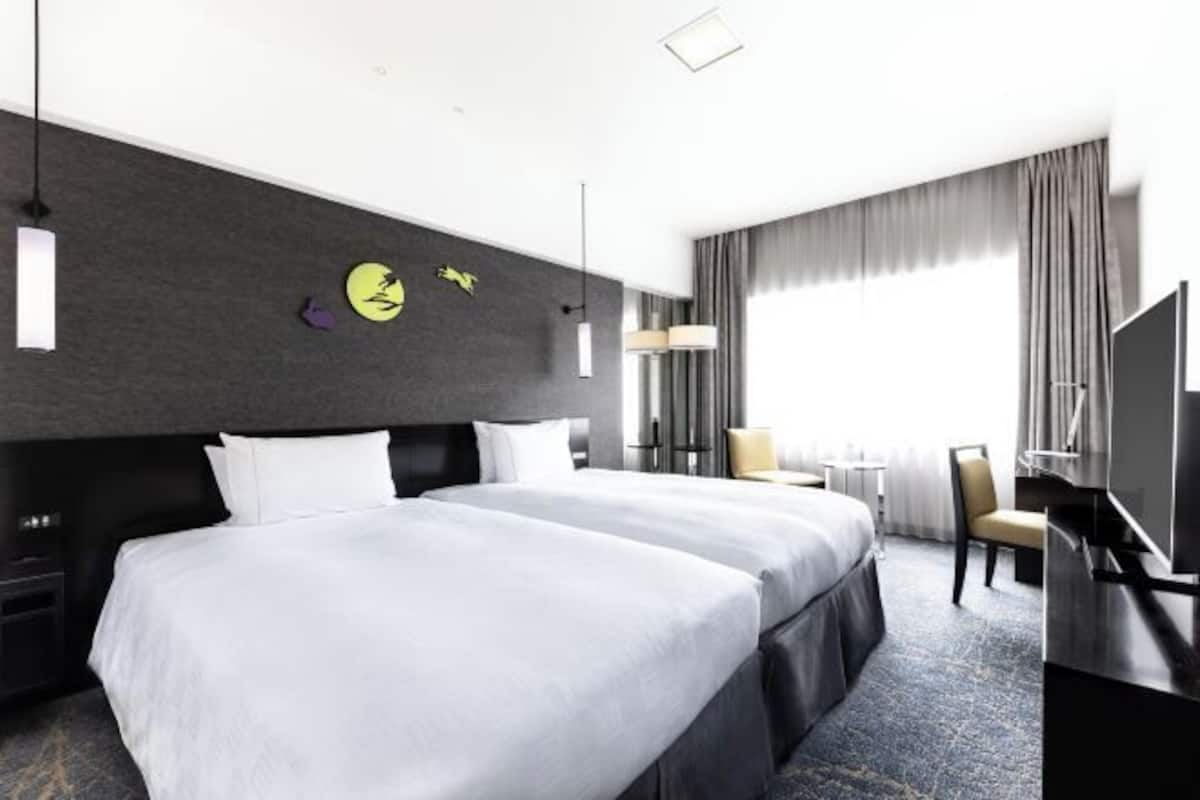 Couette en duvet d'oie, coffres-forts dans les chambres, bureau