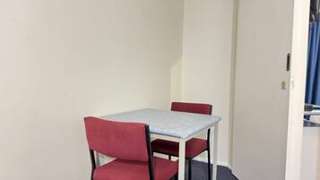 Family Quadruple Room, 1 Bedroom | In-room dining