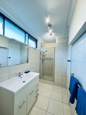 Family Quadruple Room, 1 Bedroom | Bathroom | Shower, free toiletries, towels, soap