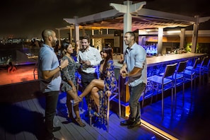 Rooftop bar, ocean views, open daily