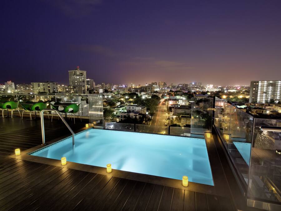 Outdoor pool, open 7:00 AM to 7:00 PM, pool umbrellas, pool loungers
