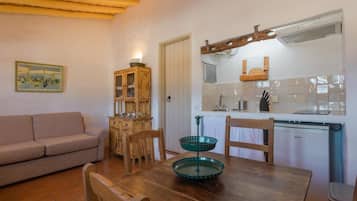 Cottage, 2 Bedrooms | Private kitchen | Mini-fridge, microwave, oven, stovetop