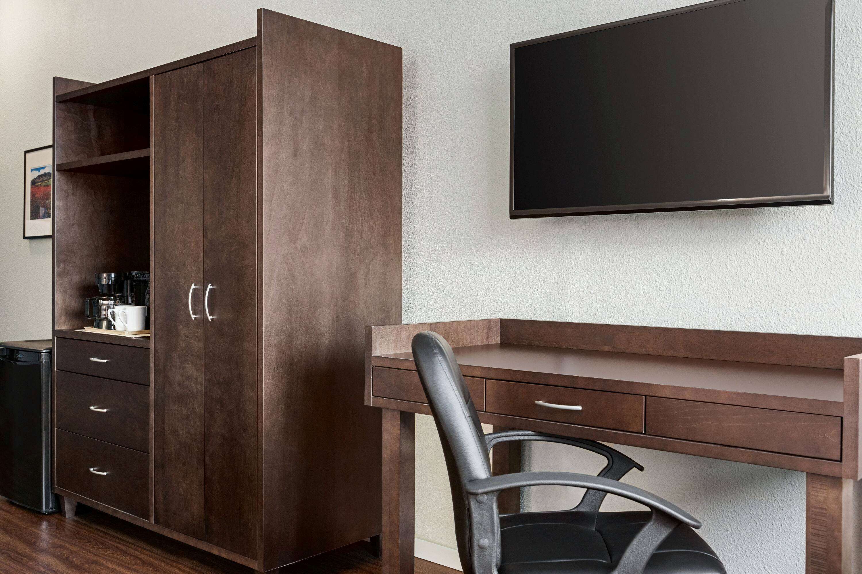 desk, blackout curtains, iron/ironing board, cots/infant beds