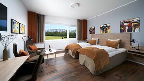 Habitación Deluxe con 1 cama matrimonial o 2 individuales | Ropa de cama hipoalergénica y escritorio