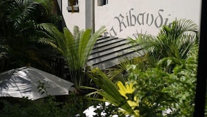 A building with a sign that reads "La Ribau." - La Ribaudière (Antananarivo)