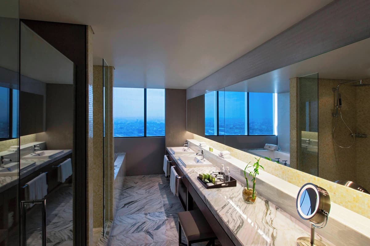 presidential suite, 2 bedrooms, city view | bathroom | shower, rainfall showerhead, hair dryer, bathrobes
