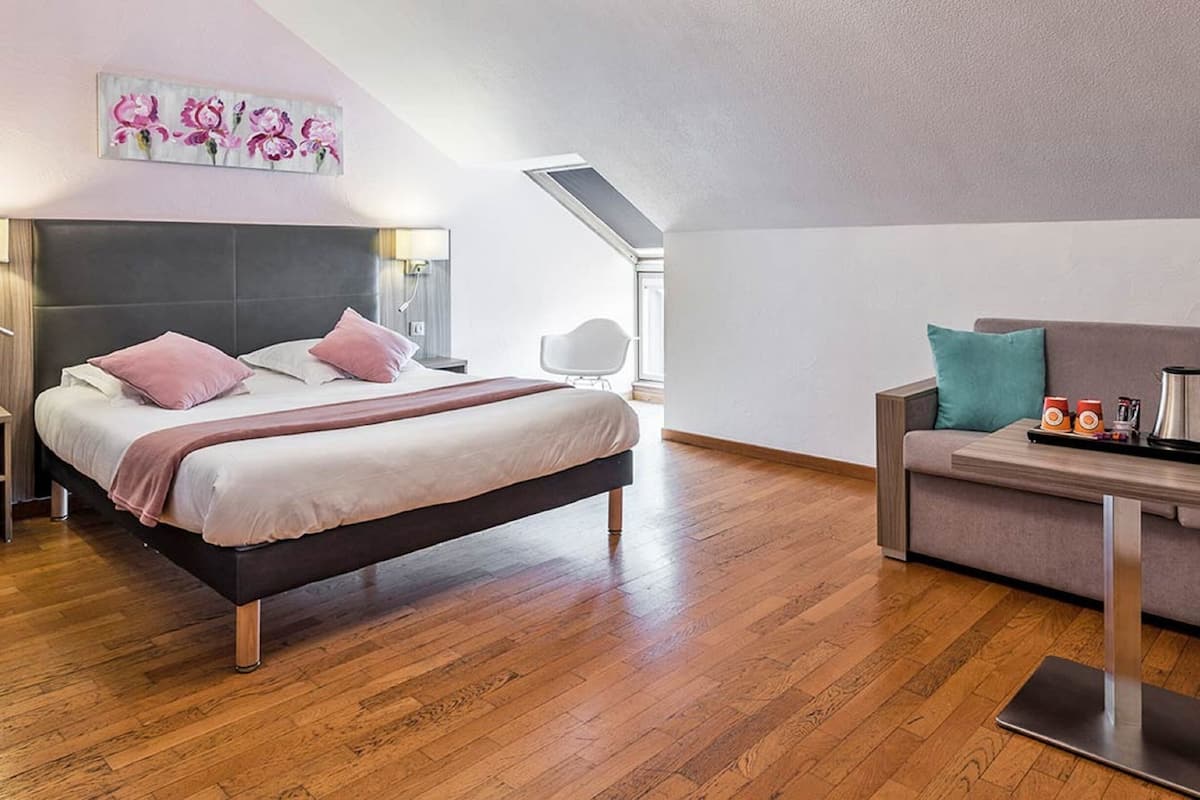 family room, jetted tub | desk, blackout curtains, soundproofing, iron/ironing board