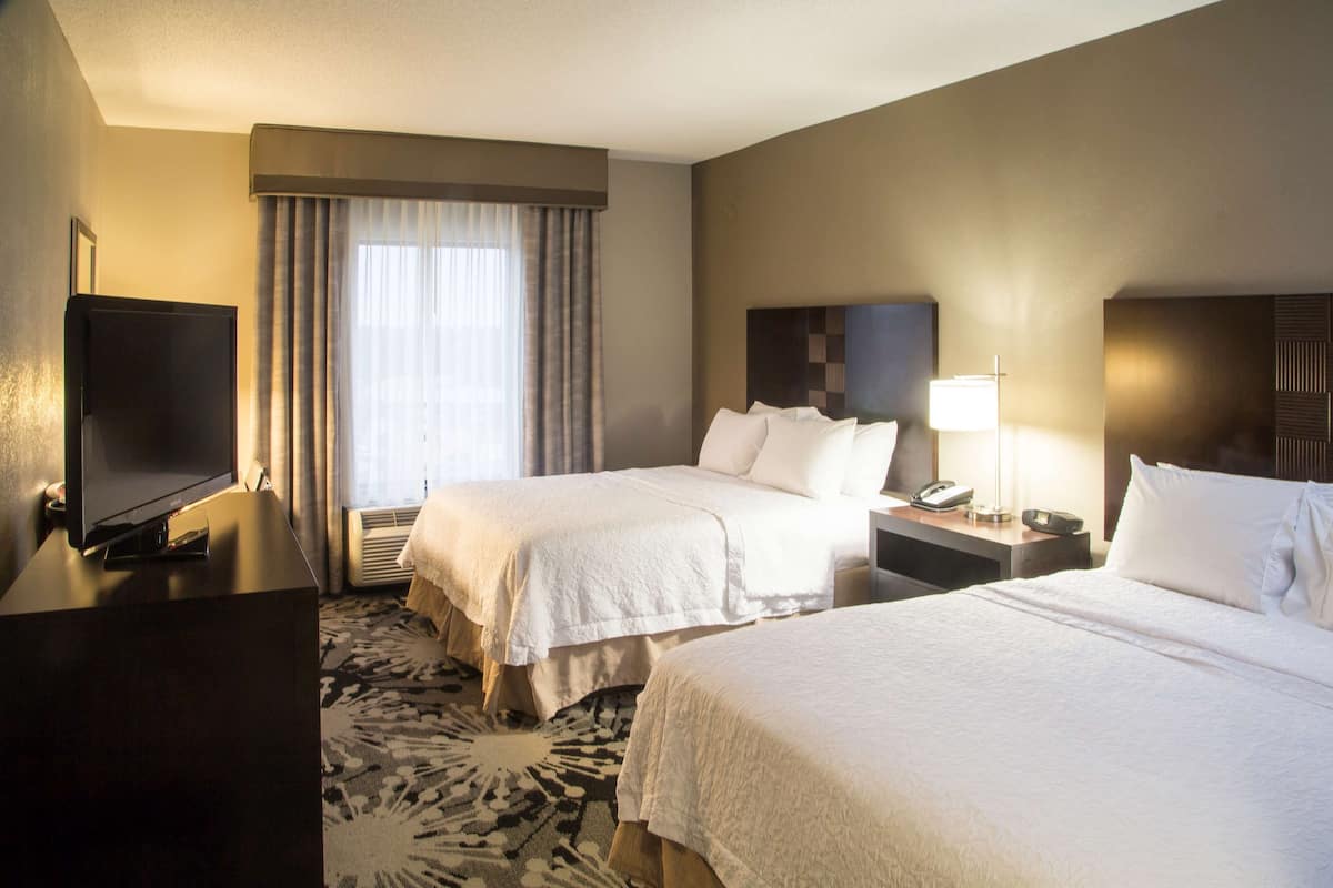 room, 2 queen beds, non smoking | in-room safe, desk, iron/ironing board, free wifi