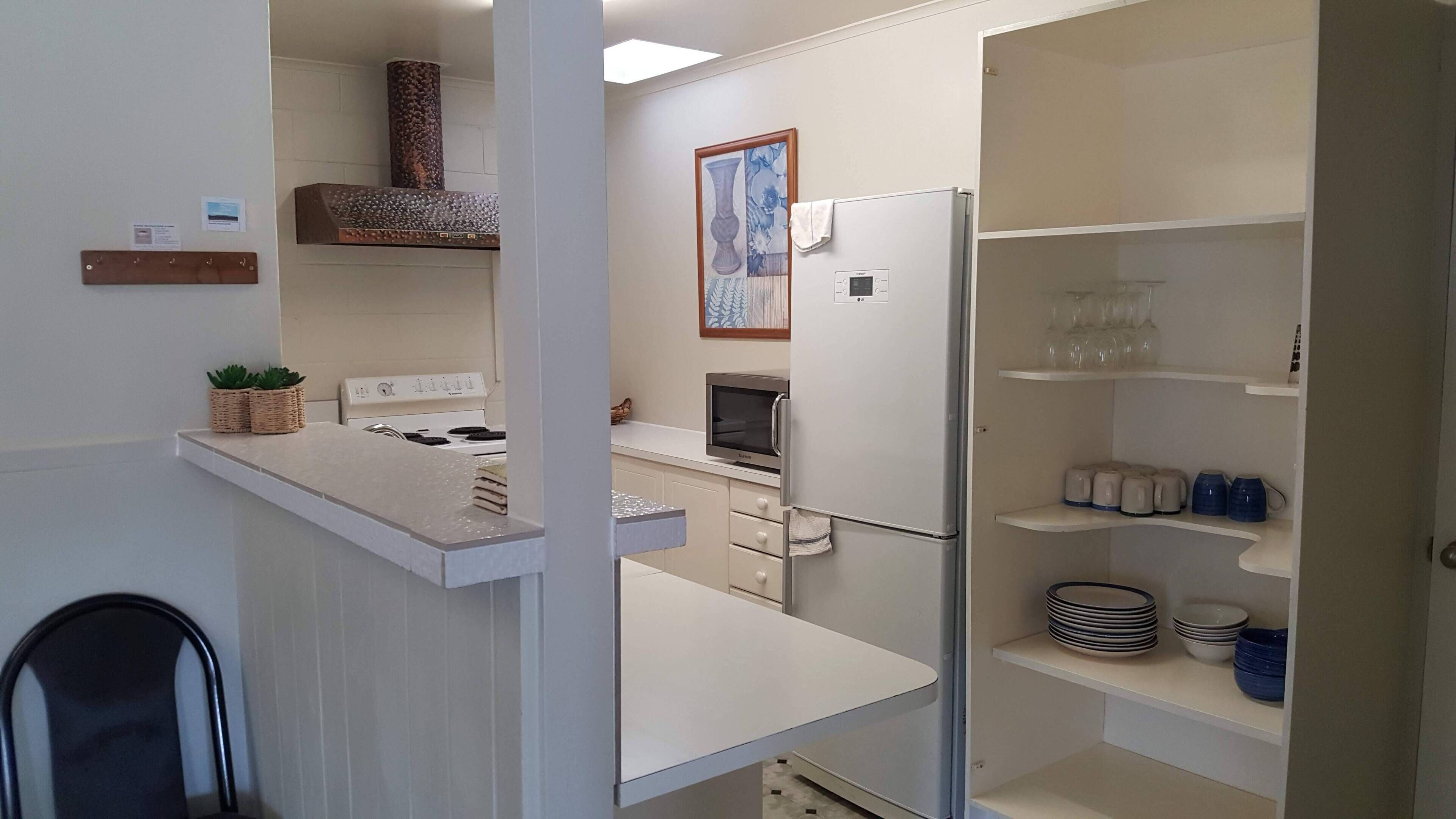 Chalé, 4 quartos | Cozinha privada | Geladeira, cafeteira/chaleira, chaleira elétrica, cadeirão de bebê