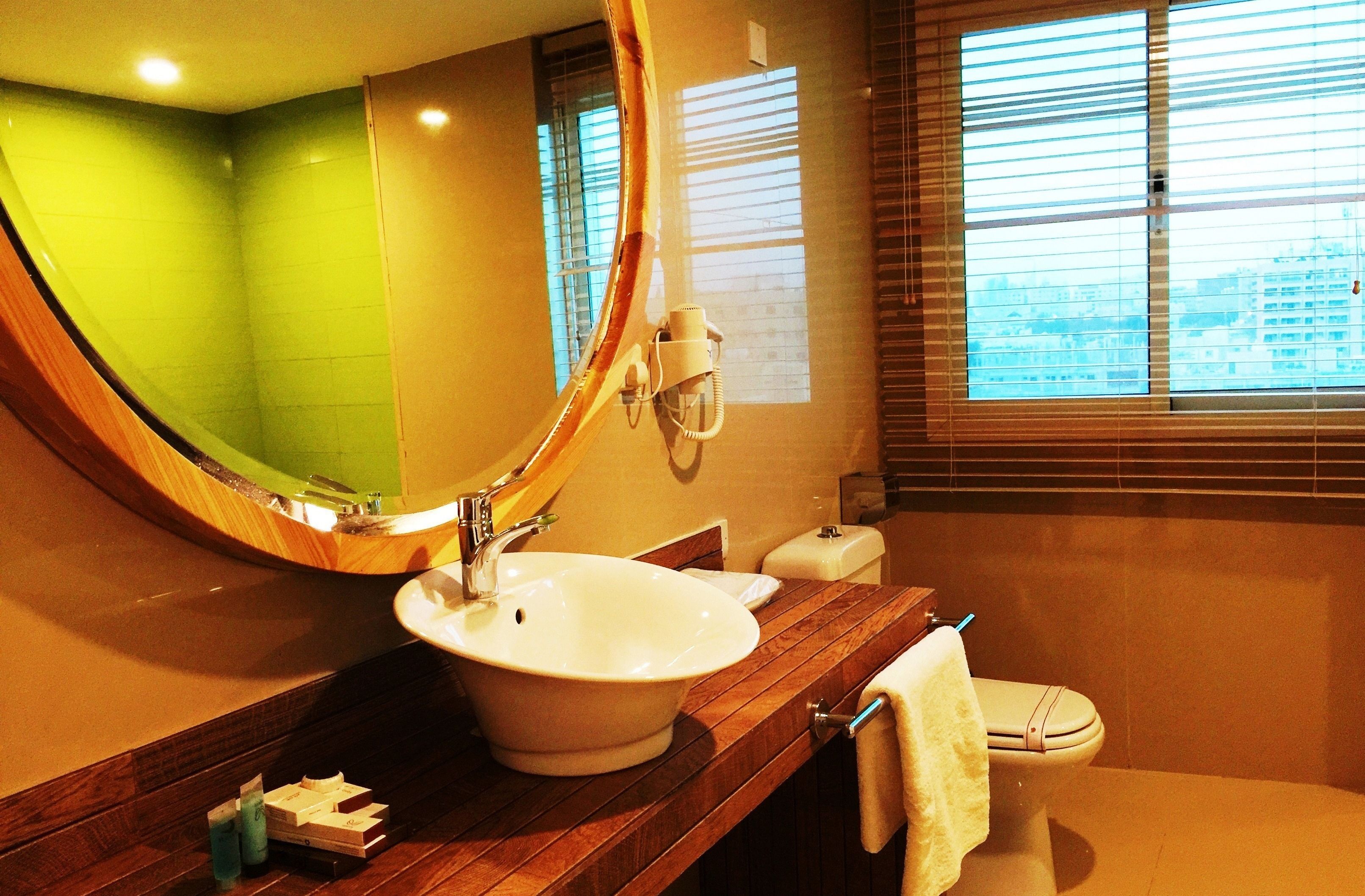 jacuzzi junior suite | bathroom | shower, rainfall showerhead, designer toiletries, hair dryer