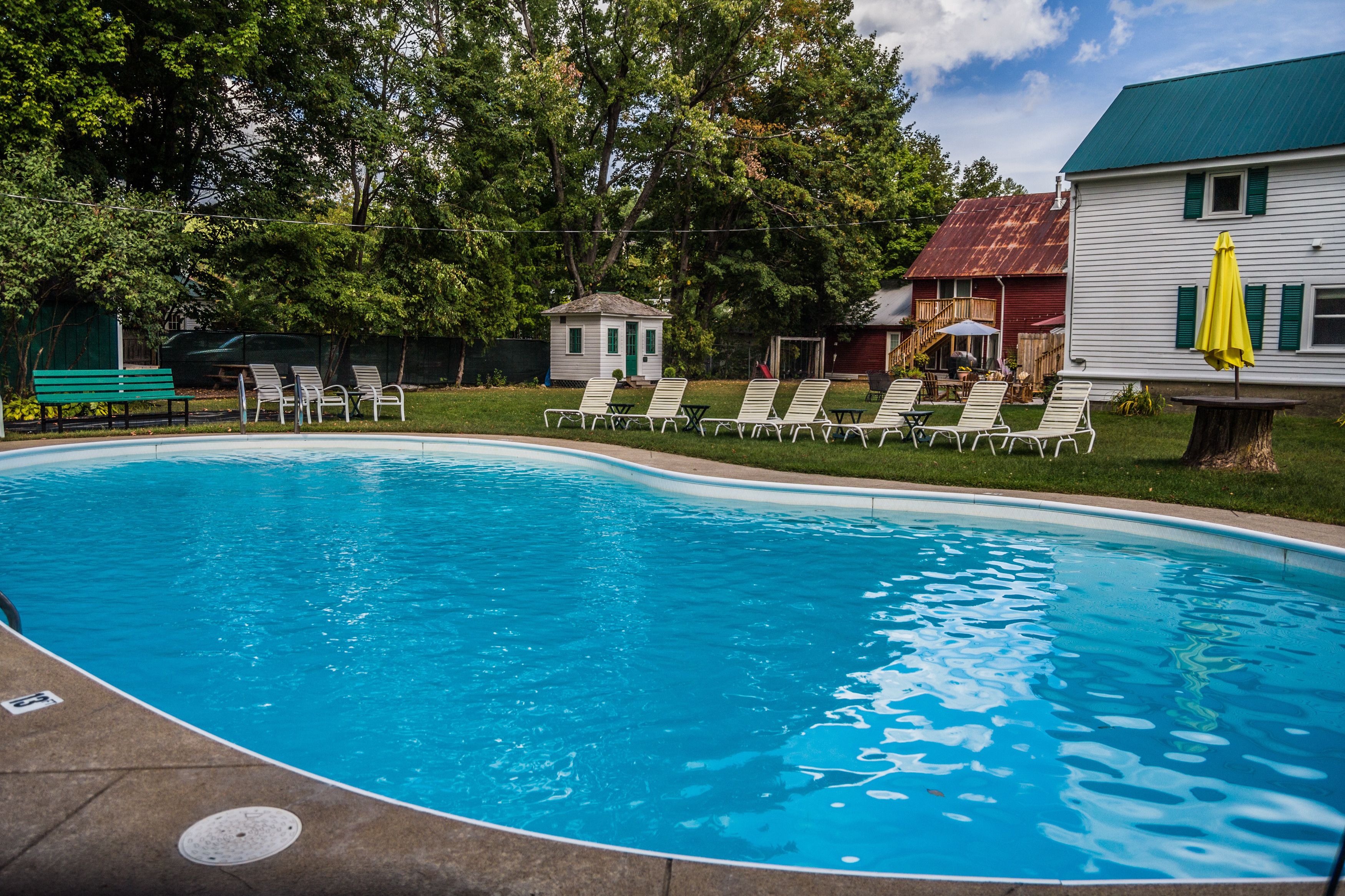 seasonal outdoor pool, open 10 am to 8 pm, pool loungers