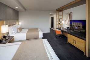 Hypo-allergenic bedding, pillow-top beds, in-room safe, desk