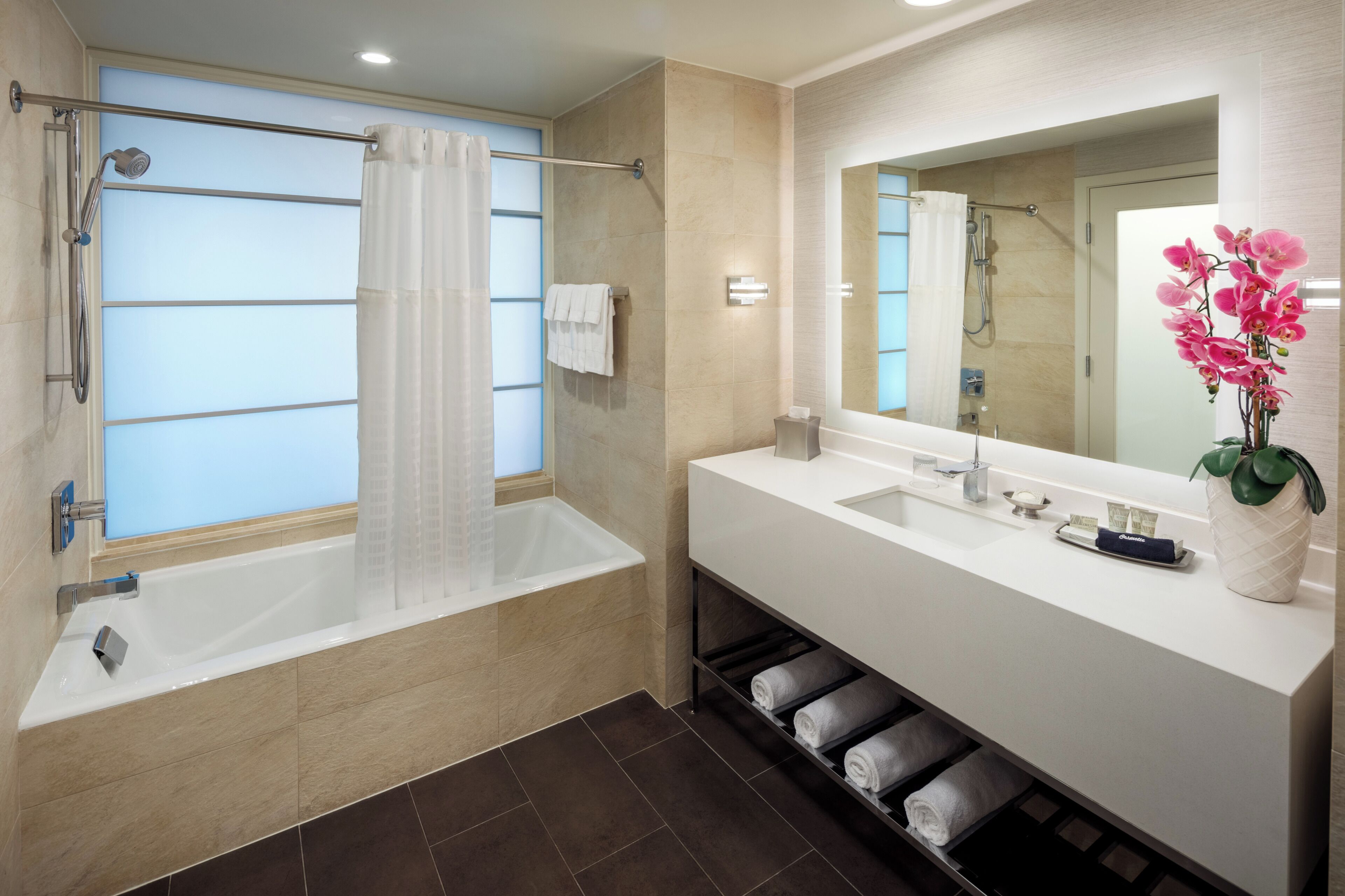 rainfall showerhead, free toiletries, hair dryer, towels