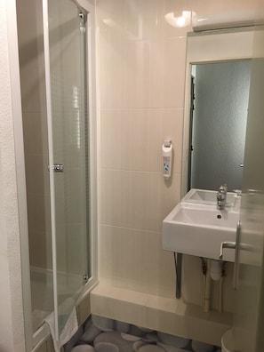 Shower, eco-friendly toiletries, hair dryer, towels