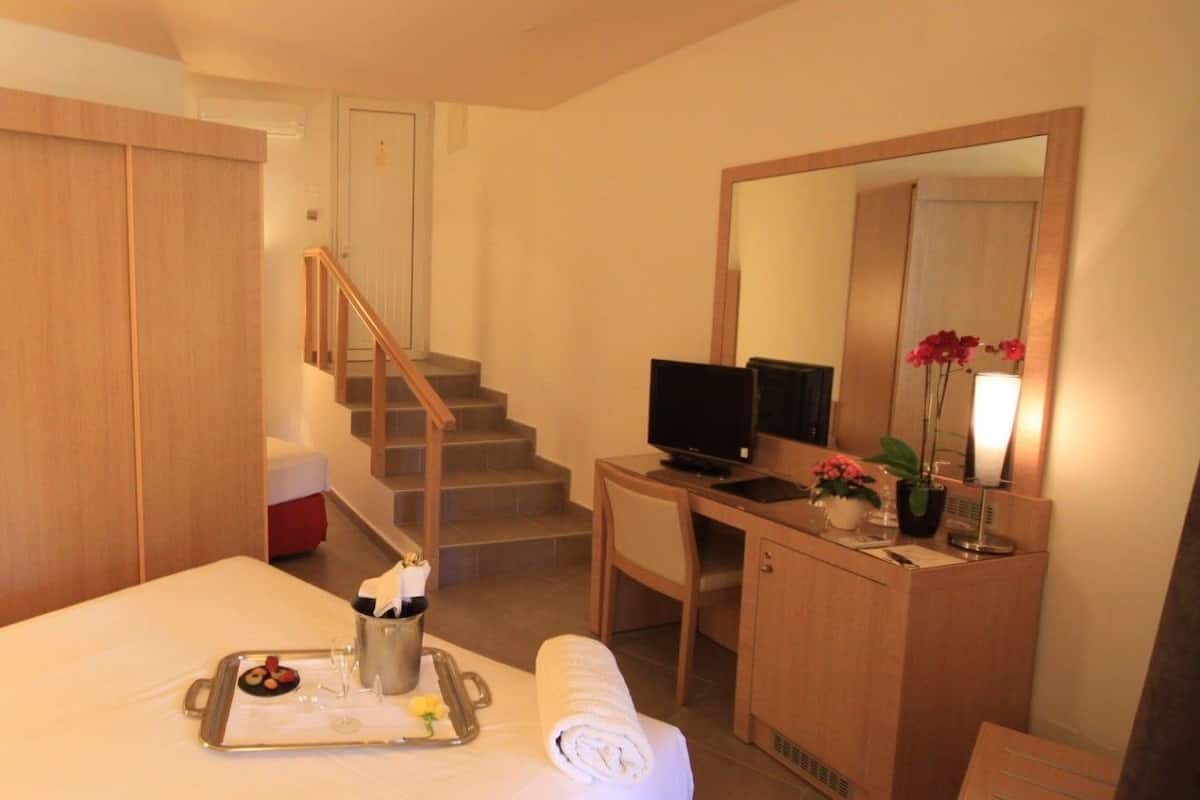 Triple Room | Individually furnished, desk, laptop workspace, blackout drapes