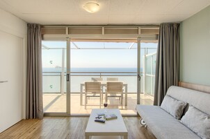 Penthouse, 1 Bedroom, Sea View | Down comforters, blackout drapes, iron/ironing board, free WiFi