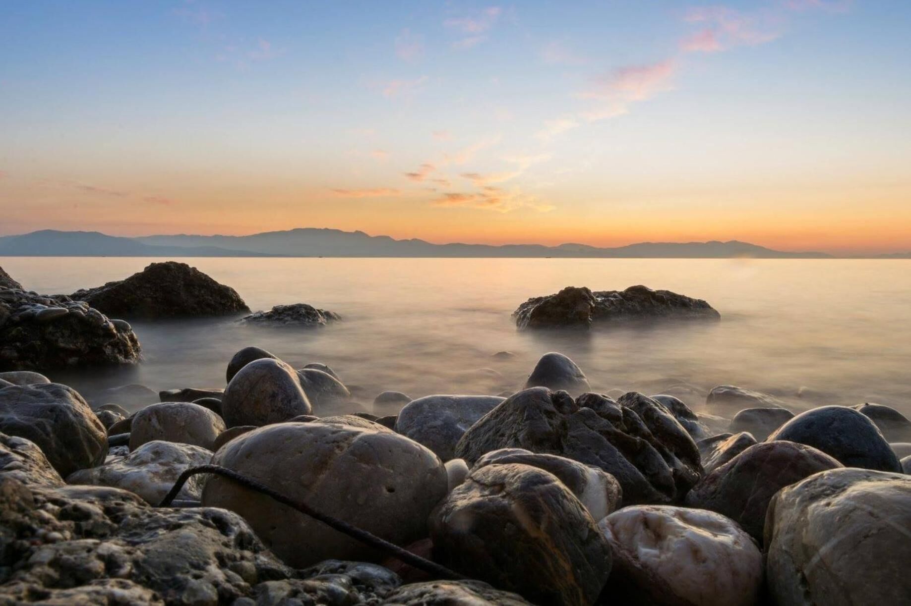 on the beach, scuba diving, windsurfing, sailing