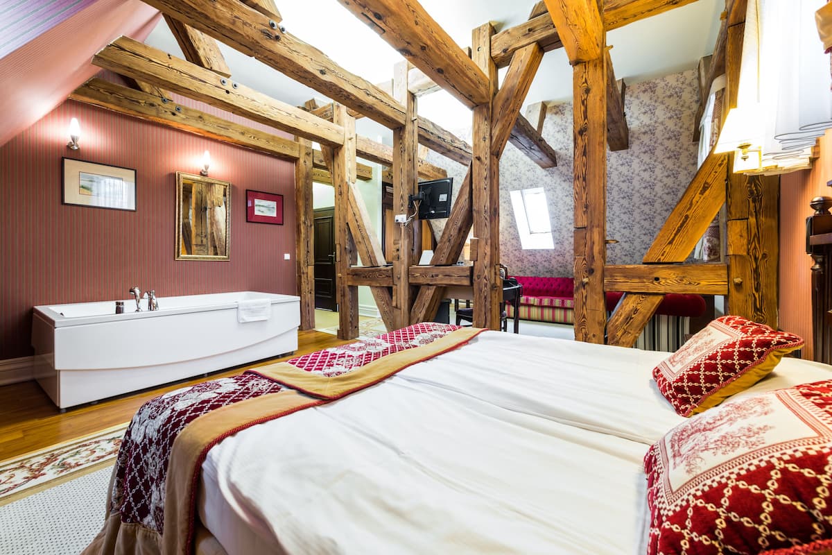 superior room | living area | 32-inch flat-screen tv with cable channels, tv, table football