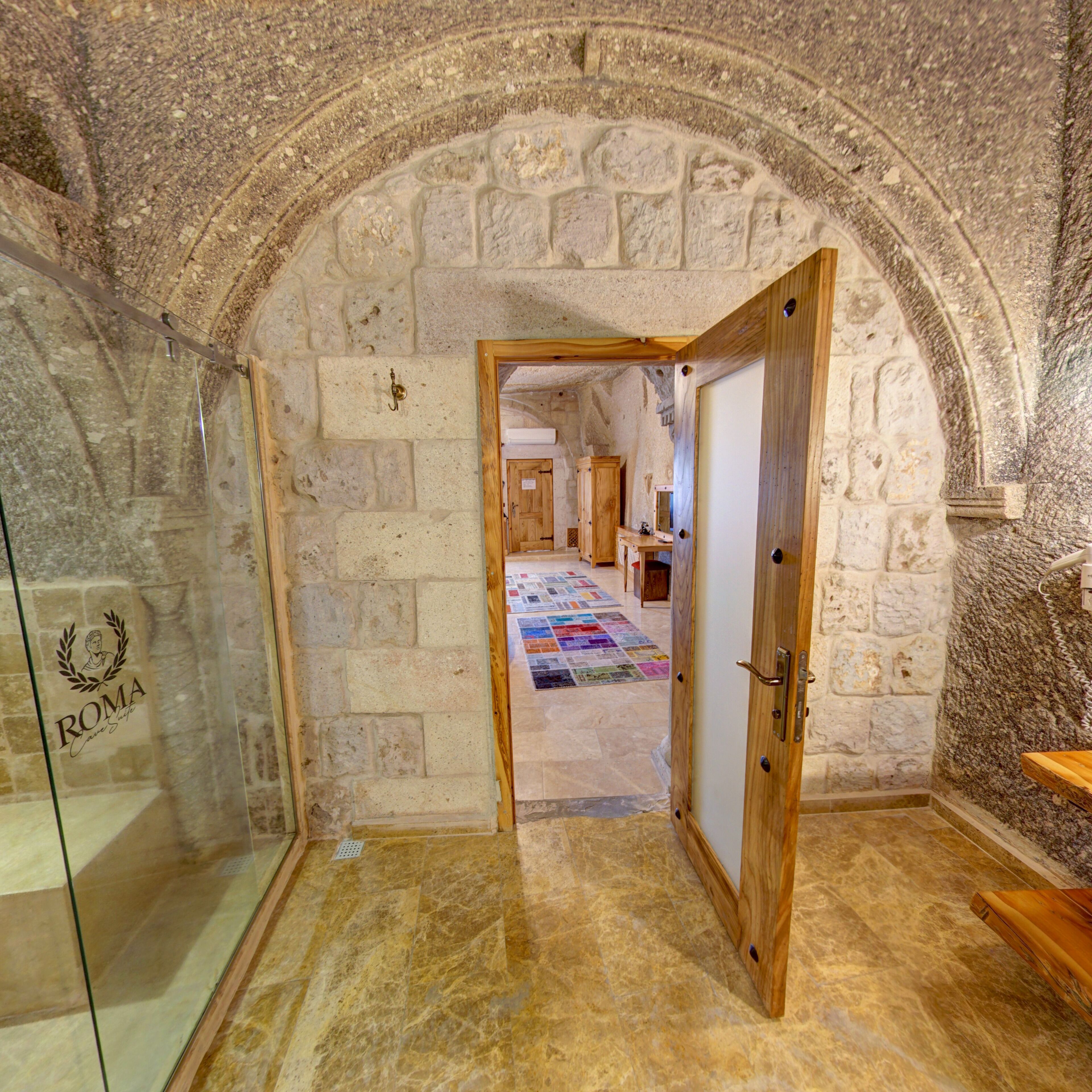 queen suite | bathroom | hair dryer, slippers, towels