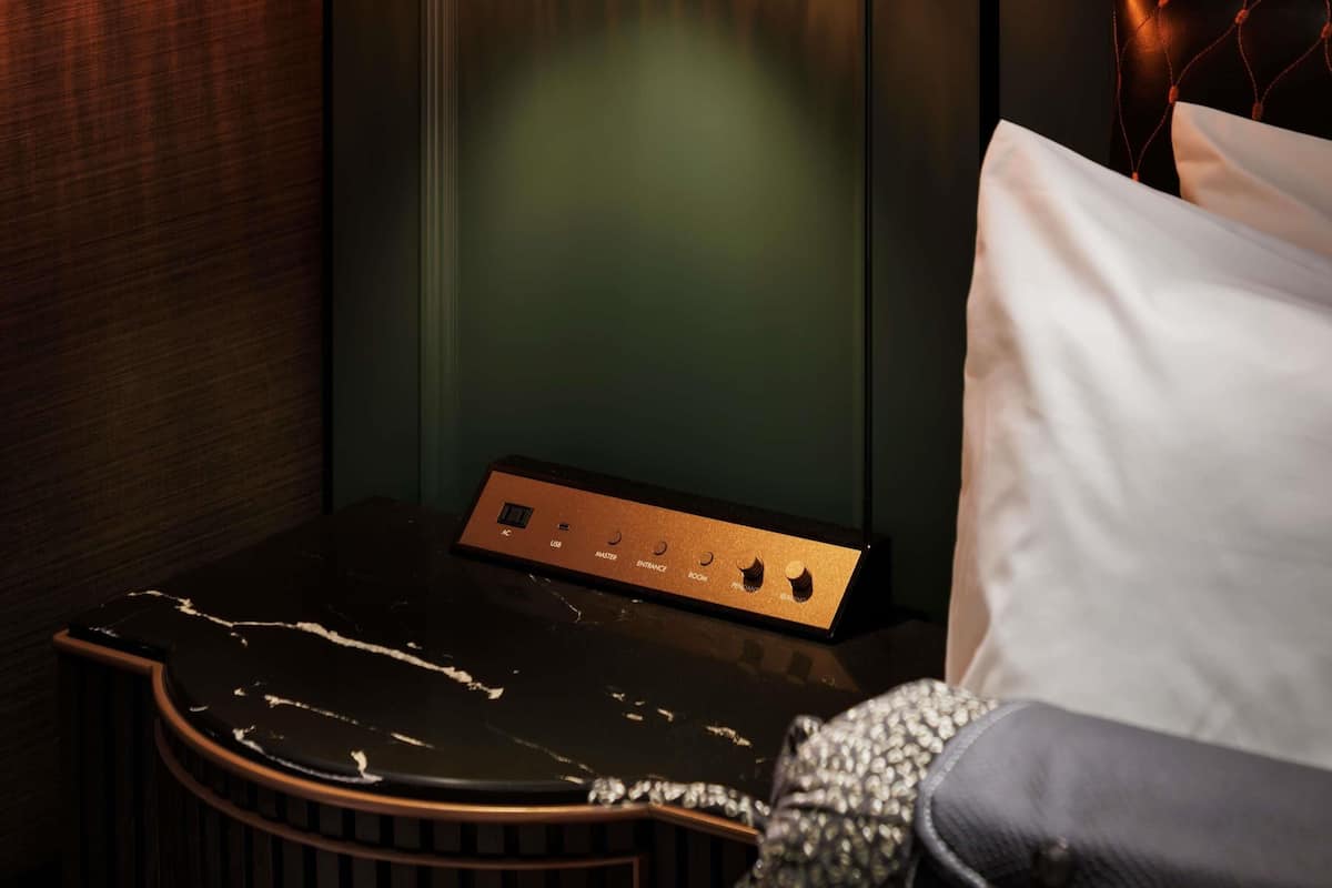 Down comforters, desk, blackout drapes, iron/ironing board