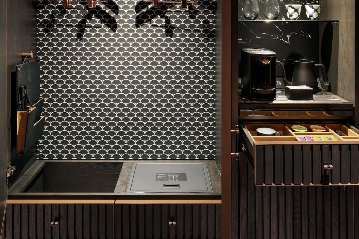 Down comforters, desk, blackout drapes, iron/ironing board