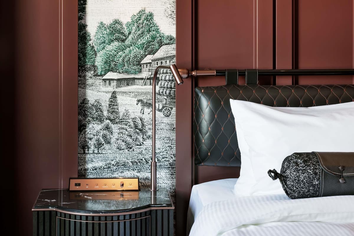 Down comforters, desk, blackout drapes, iron/ironing board