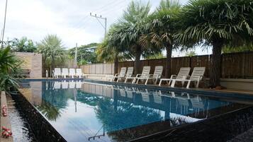 Outdoor pool, open 7:00 AM to 8:00 PM, sun loungers
