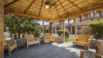 Outdoor pool, open 7 AM to 11 PM, pool umbrellas, pool loungers