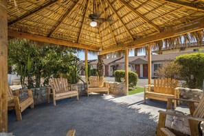 Outdoor pool, open 7 AM to 11 PM, pool umbrellas, pool loungers