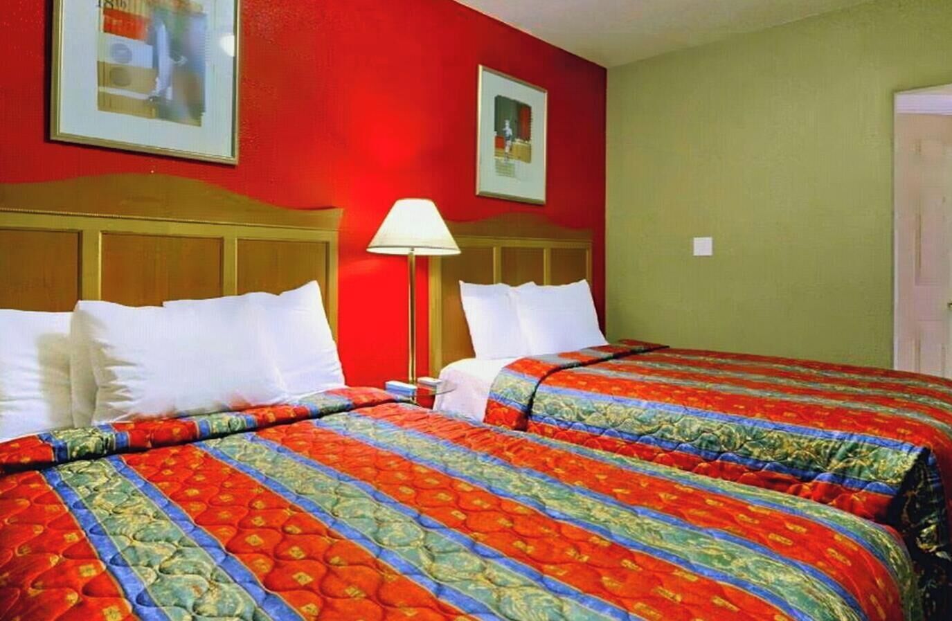 Desk, blackout drapes, iron/ironing board, bed sheets
