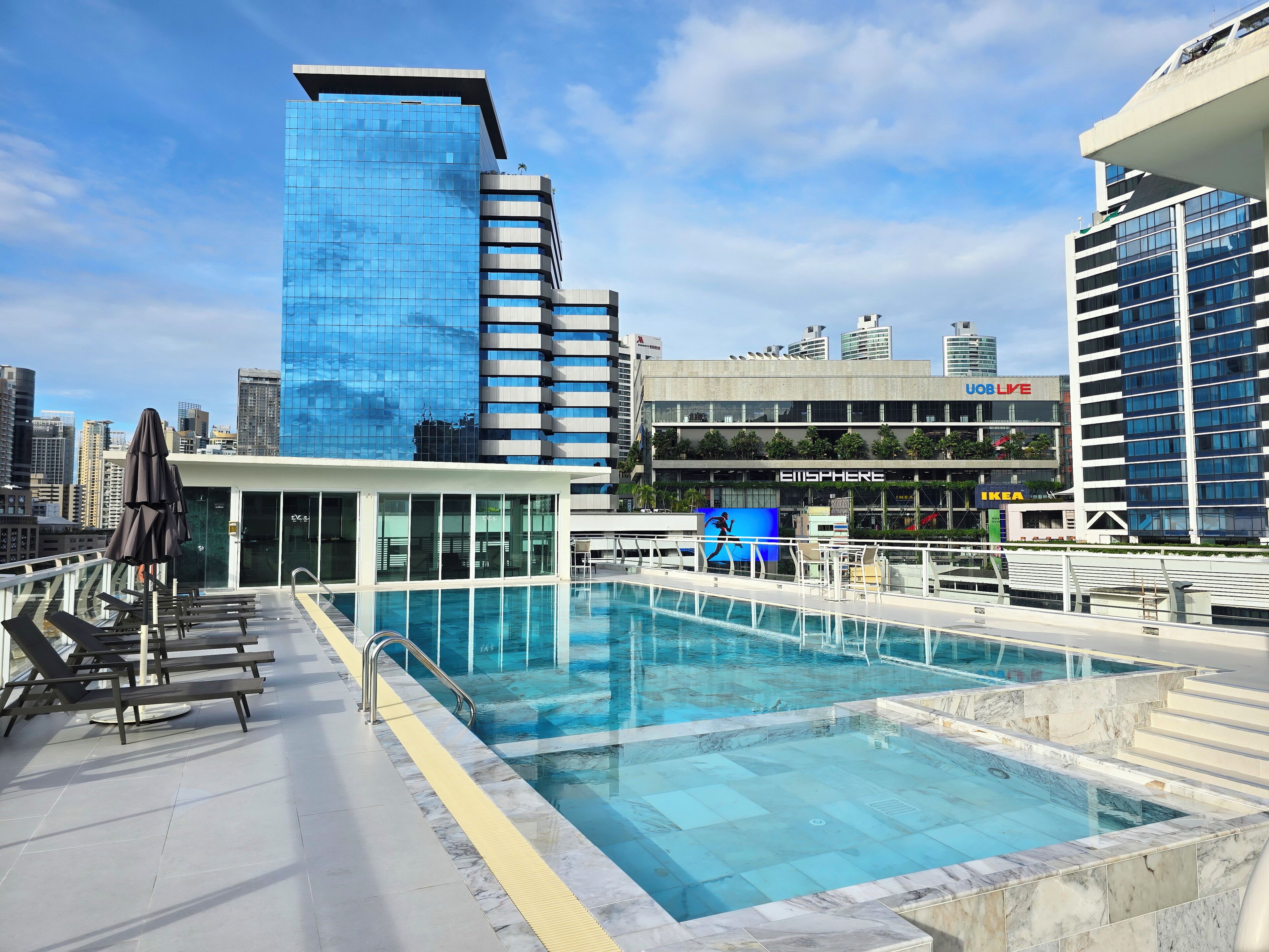 outdoor pool, pool umbrellas, pool loungers