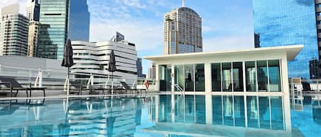 Outdoor pool, pool umbrellas, pool loungers