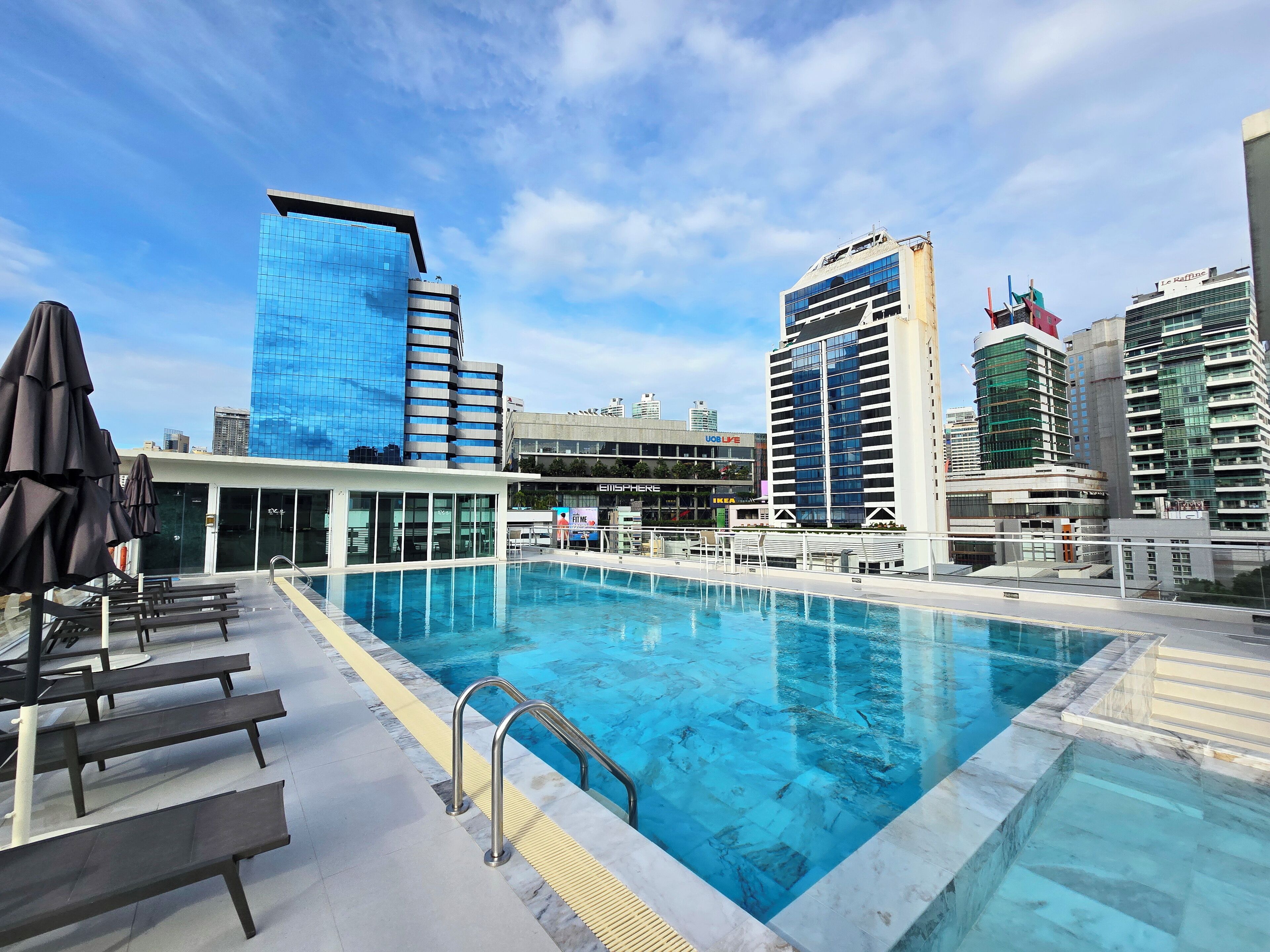 outdoor pool, pool umbrellas, pool loungers