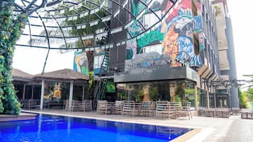 Outdoor pool, open 10:00 AM to 7:00 PM, pool umbrellas, pool loungers