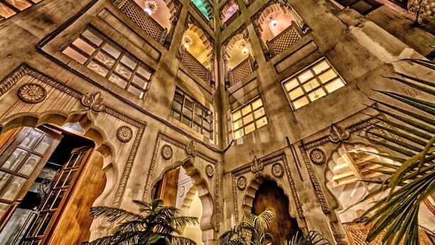 A historic building with multiple arched windows and intricate architectural details. - Jyoti Mahal A Royal Heritage Hotel - 5 Mins from New Delhi Railway station & 2Mins From Metro (New Delhi)