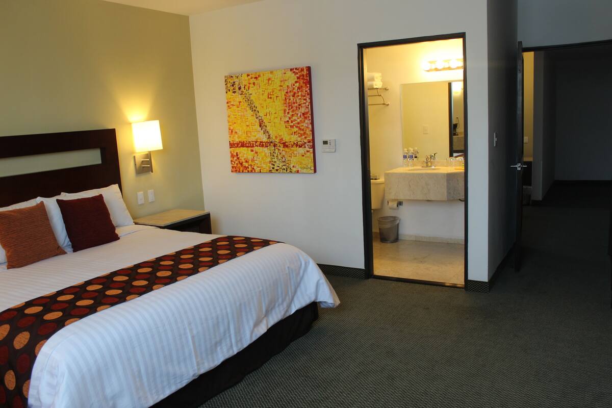 superior suite (expedia) | premium bedding, in-room safe, desk, soundproofing