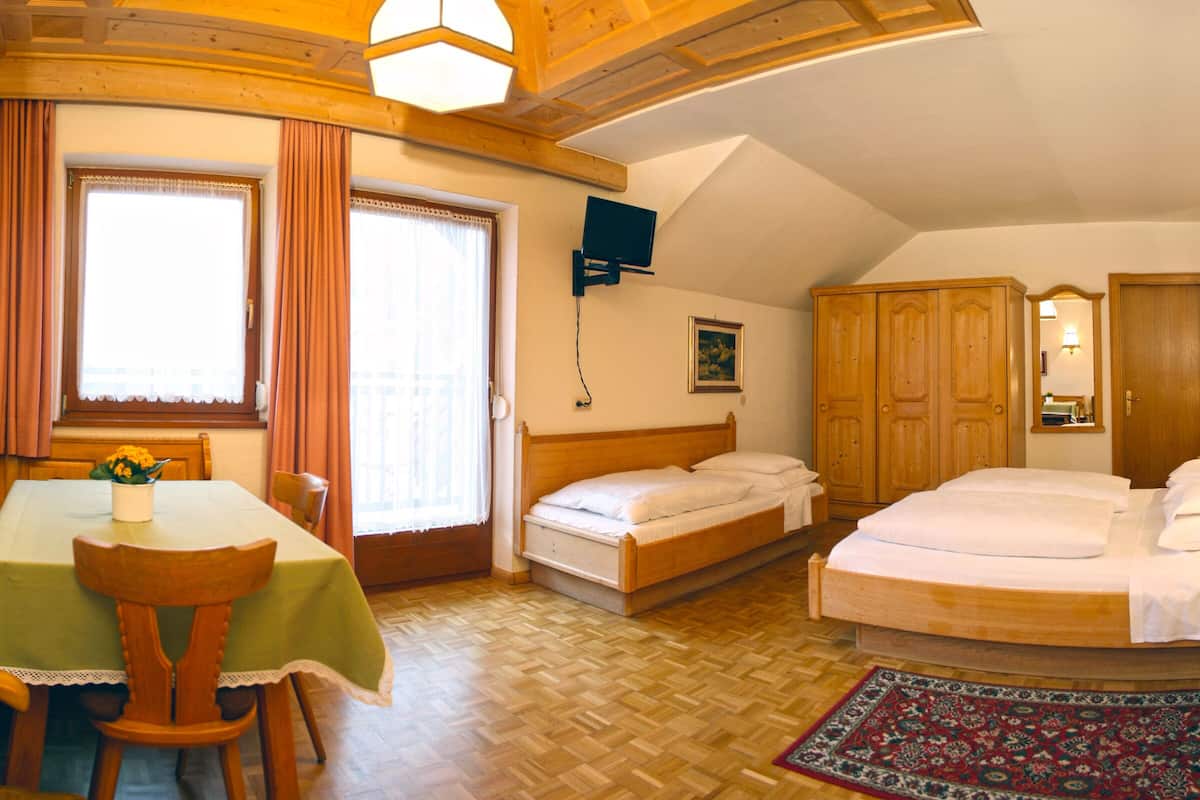 family room | down duvets, in-room safe, desk, blackout curtains